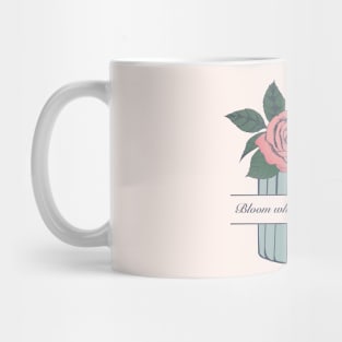 Bloom Where you're planted. Roses and Crocus flower in a small blue vase. Mug